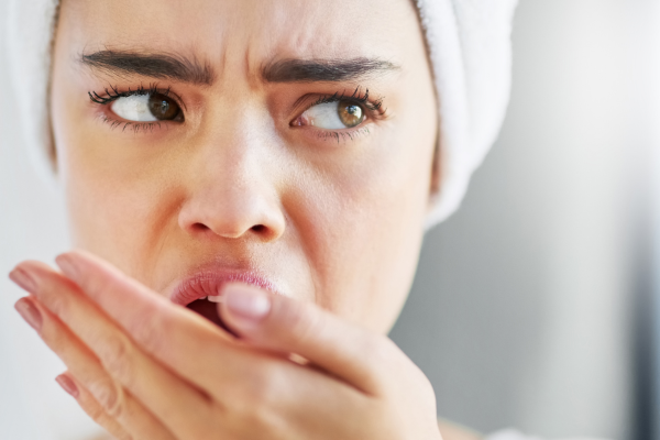 Woman with bad breath.